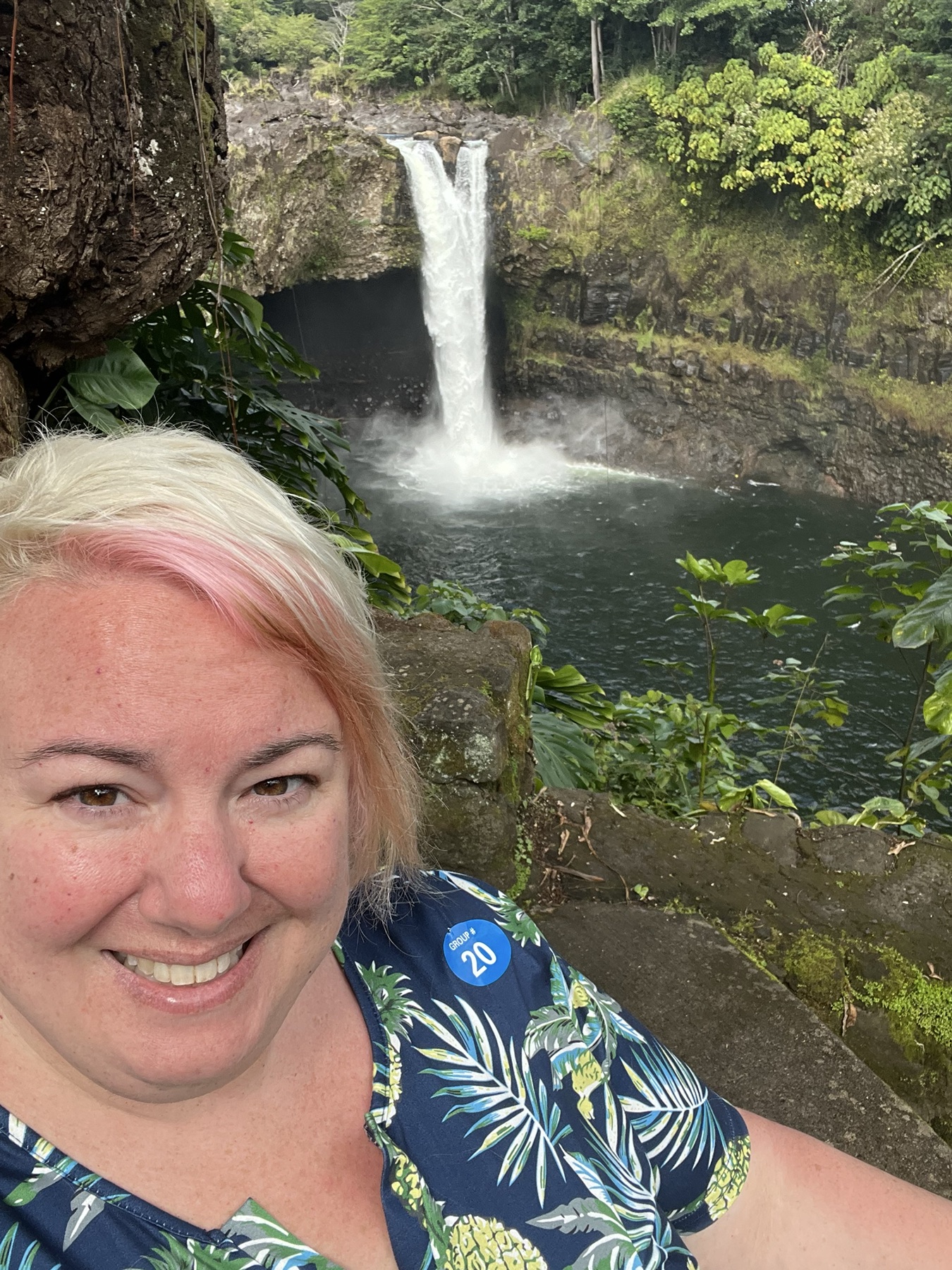 Jenn exploring a tropical waterfall destination